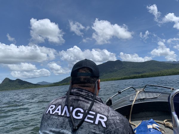 Ranger cleaning up crab pots Hinchinbrook Channel